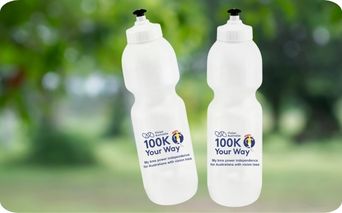 Two white water bottles with 100K Your Way logo