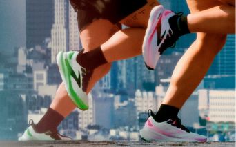 Two pairs of legs running each wearing a pair of Brooks Glycerine 23s