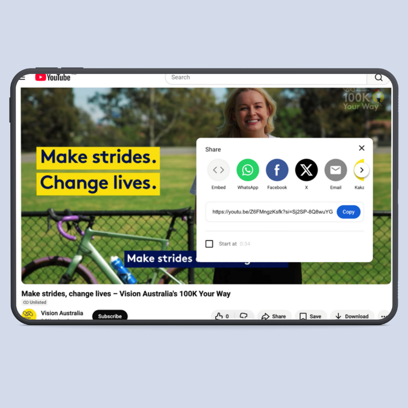 Screenshot of YouTube shows how to share a YouTube video by selecting the blue Copy button next to a URL. 